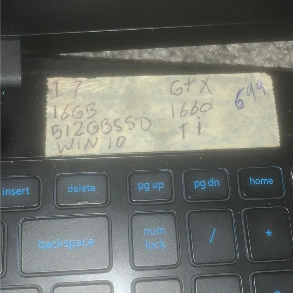 One black used dell laptop